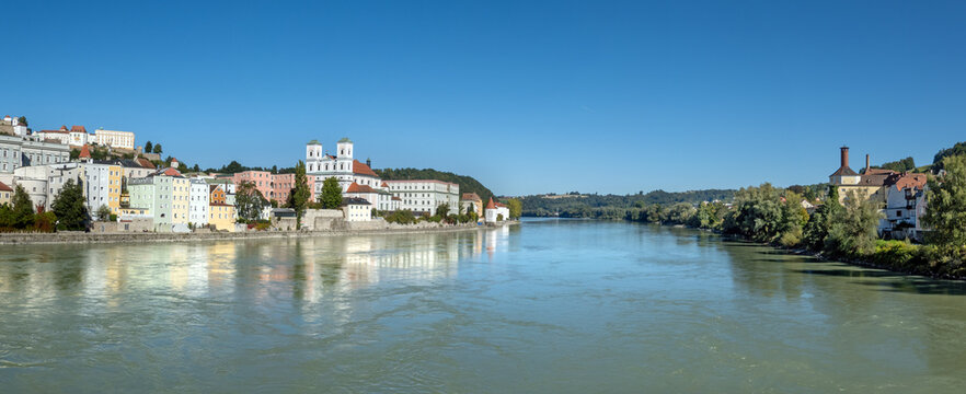 Passau, Bavaria, Germany: panoramic view on the fast flowing Inn river and St Michael church in the old town, seen from the Marienbrucke