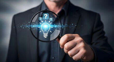Searching for new ideas and solutions concept with magnifying glass and light bulb symbol idea
