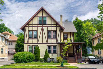 Charming Tudor-style home with lush greenery and suburban tranquility in Newton, Massachusetts, USA
