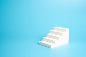 White stairs steps. Concept of growth and development. Career, training. Levels of difficulty. Moving upward. Personal success, education, and leadership development.