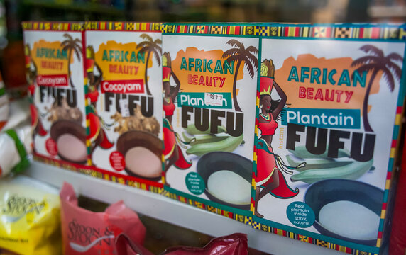 Alto Adige, Italy - July 03, 2025: African Beauty brand fufu packaging displayed on shelf showcasing plantain and cocoyam varieties with vibrant colors