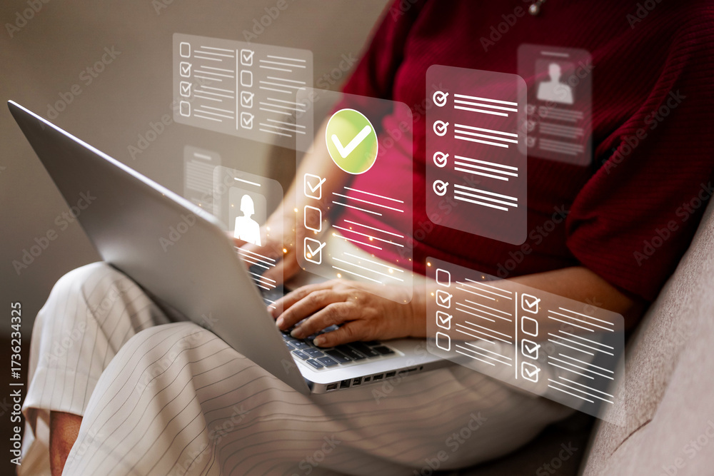 Wall mural person hands using laptop keyboard completing digital forms online checklists task management modern
