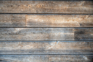 Weathered Wood Planks Create Rustic Exterior Wall Texture and Natural Siding
