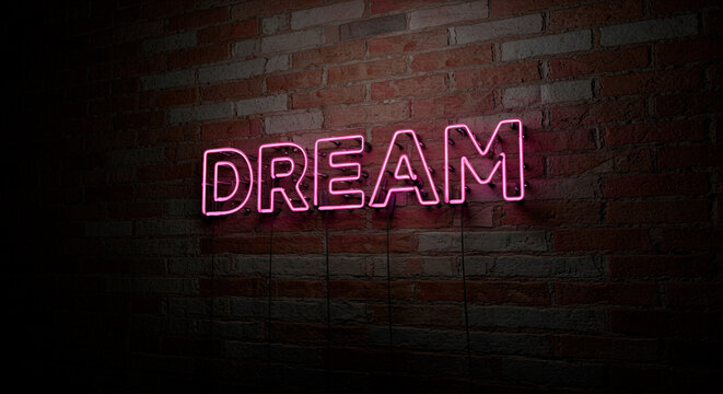 DREAM word in bright pink neon sign glowing over a dark brick wall