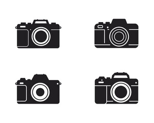 Set of four black silhouette icons representing vintage and modern cameras on a white background