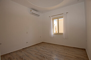 Empty bedroom in unfurnished vacant apartment