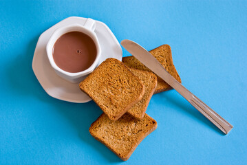 Breakfast With Toast and Hot Chocolate on Blue Background