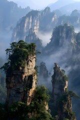 Majestic mountains covered in lush greenery, shrouded in misty clouds.