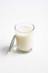 A Glass Of Milk On A White Background