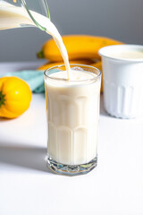 A Glass Of Milk On A White Background