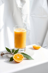 A Glass Of Orange Juice On A White Background