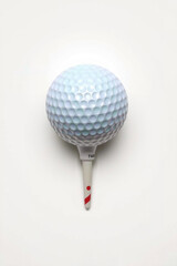 A Golf Ball On A Tee On A White Background