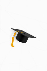 A Graduation Cap On A White Background