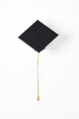 A Graduation Cap On A White Background