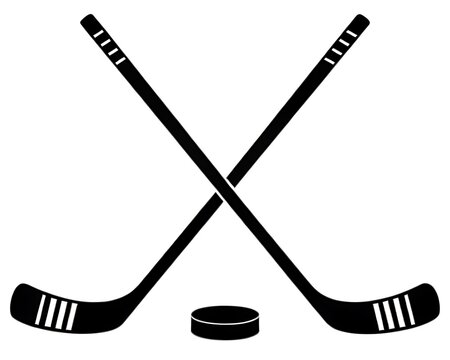 Two crossed hockey sticks and a puck on a white background