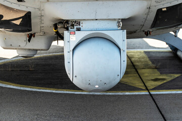 Optical sighting device on the chassis of a military helicopter
