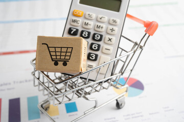 Online shopping, Shopping cart box on business graph, import export, finance commerce.