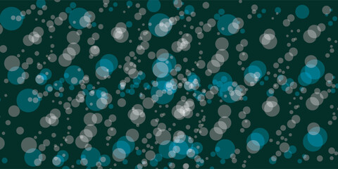Abstract pattern of soft glowing blue teal and white bokeh circles floating on a dark green background.