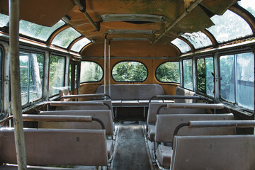 Abandoned Vintage Bus Interior with Empty Seats