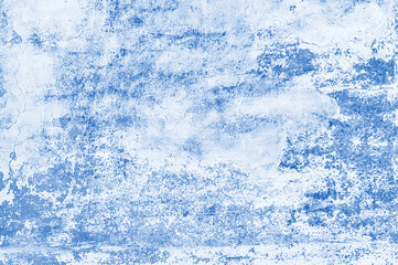Elegant blue background. Grunge background with a rich blue wall texture, a shadowed border and a glowing center.