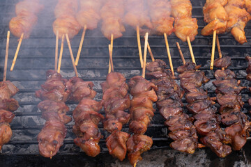 Marinated meat with sauce and spices Many flavorings Bamboo skewers grilled with charcoal