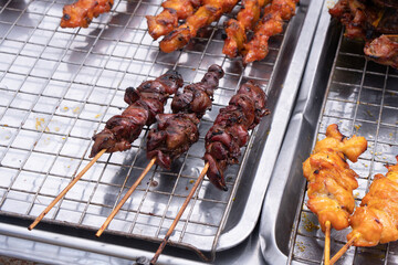 Marinated meat with sauce and spices Many flavorings Bamboo skewers grilled with charcoal