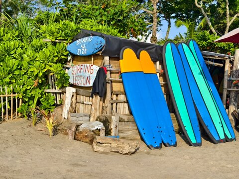 Seminyak, Bali, Indonesia &ndash; 28 September 2025: A small bamboo surf shack offering surfing lessons and renting surfboards for tourists
