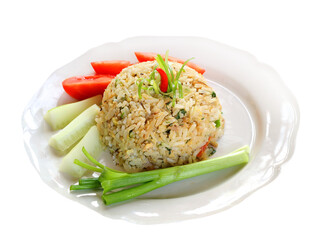 Crab fried rice in a white sera plate with tomatoes, cucumbers and spring onions  on transparent.