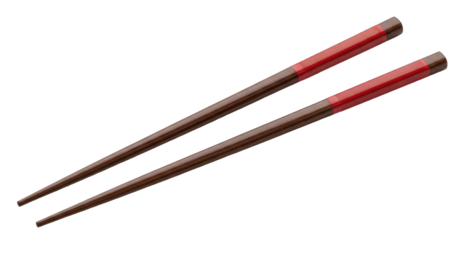 Isolated pair of wooden chopsticks with red band, traditional Asian culinary utensils