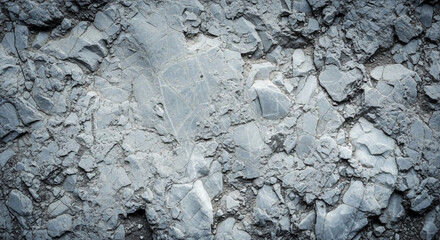 Discover the rugged beauty of textured grey stone, perfect for dramatic backgrounds, natural design elements, and conveying raw, earthy textures.