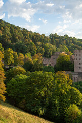 Autumn view of a castle in a lush landscape