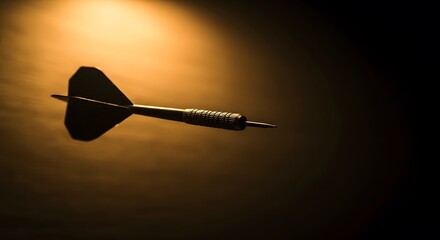 Dart on a Gradient Orange and Black Background