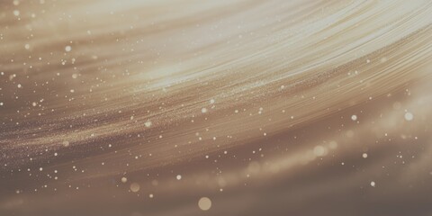 Obraz premium Golden swirls with shimmering particles create a mesmerizing abstract background in soft lighting - Low Contrast