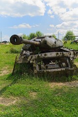 Minsk region, Belarus, July 12, 2025. A broken, rusty Soviet tank on the Stalin Line.                               