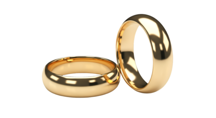 Two Gold Wedding Rings on Black Background graphic