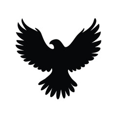 Black silhouette of an eagle spreading its wings, showing powerful freedom