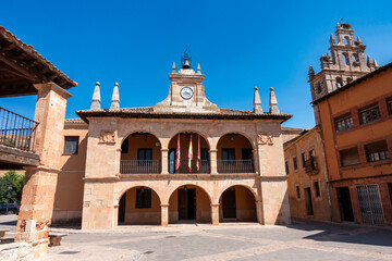 Obraz premium The 17th-century Baroque Town Hall (Ayuntamiento) in the Plaza Mayor of Ayllón, Segovia, Spain.