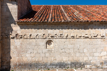 The 12th-13th century Romanesque frieze known as the "mensario" (agricultural calendar) on the Chapel of San Galindo in Campis&aacute;balos, Spain.