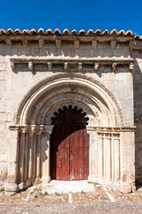 The ornate 12th-13th century Romanesque portal of the Chapel of San Galindo in Campis&aacute;balos, Spain.