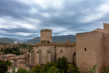 Naklejka premium Venerable Gothic Architecture Santa Maria la Mayor Church Valderrobres Teruel Spain 15th Century Religious Monument from High Viewpoint