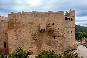 Naklejka premium Magnificent Gothic Architecture Valderrobres Castle Teruel Spain 15th Century Medieval Fortress Wall and Defensive Structure