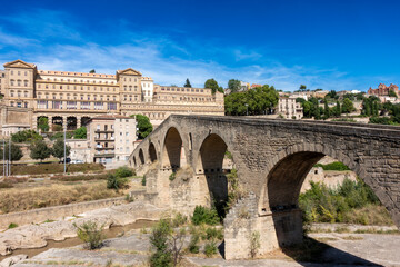 Historic Pont Vell Bridge Manresa Barcelona Spain Medieval Arches and Baroque Sant Ignasi Sanctuary on Cliff