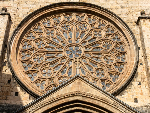 Magnificent Gothic Rose Window Sant Cugat del Vall&egrave;s Monastery Barcelona Spain 14th Century Ornate Tracery and Stone Facade Detail