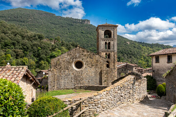 Fototapeta premium The 12th-century Romanesque church of San Cristóbal nestled in the mountain village of Beget, Catalonia, Spain.