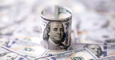 Money background with Franklin on the 100-dollar note. Texture of US money banknotes. 100 USD bills. American hundred-dollar money. Cash theme with payment and deposit money.