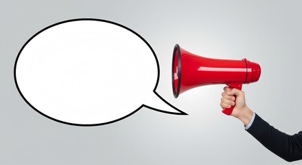 Hand holding a red megaphone with empty speech bubble on gray background
