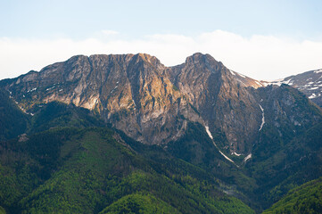 Naklejka premium Tatra Mountains (Poland) - Giewont before sunset. View from Gubałówka.