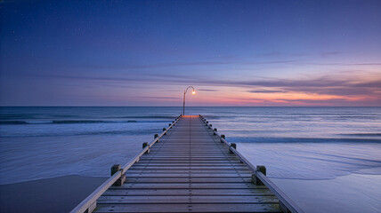 Serene Ocean Pier at Dusk with Twilight Sky and Gentle Waves Perfect for Contemplation and Relaxation