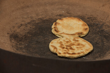Handmade Corn Tortillas Cooked on a Clay Griddle