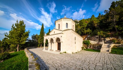 Picturesque chapel nestled in a hillside landscape